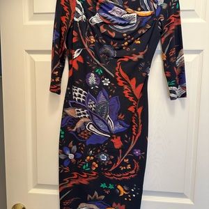 Roberto Cavalli sheath dress. Size EU 42. Sleeves 3/4.Length 40”. Looks like new